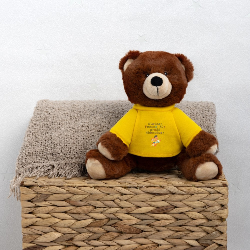 Teddy Bär „Kleiner Freund für große Abenteuer“ im Outdoor-Setting - Sonnengelb