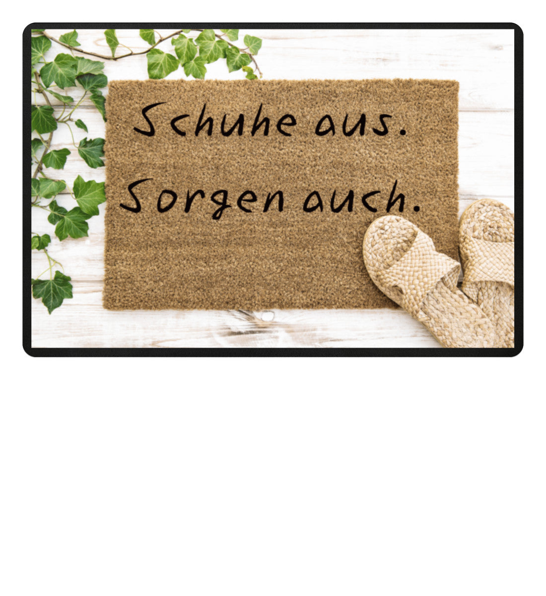 Fußmatte mit Spruch „Schuhe aus, Sorgen auch“ vor einer modernen Haustür